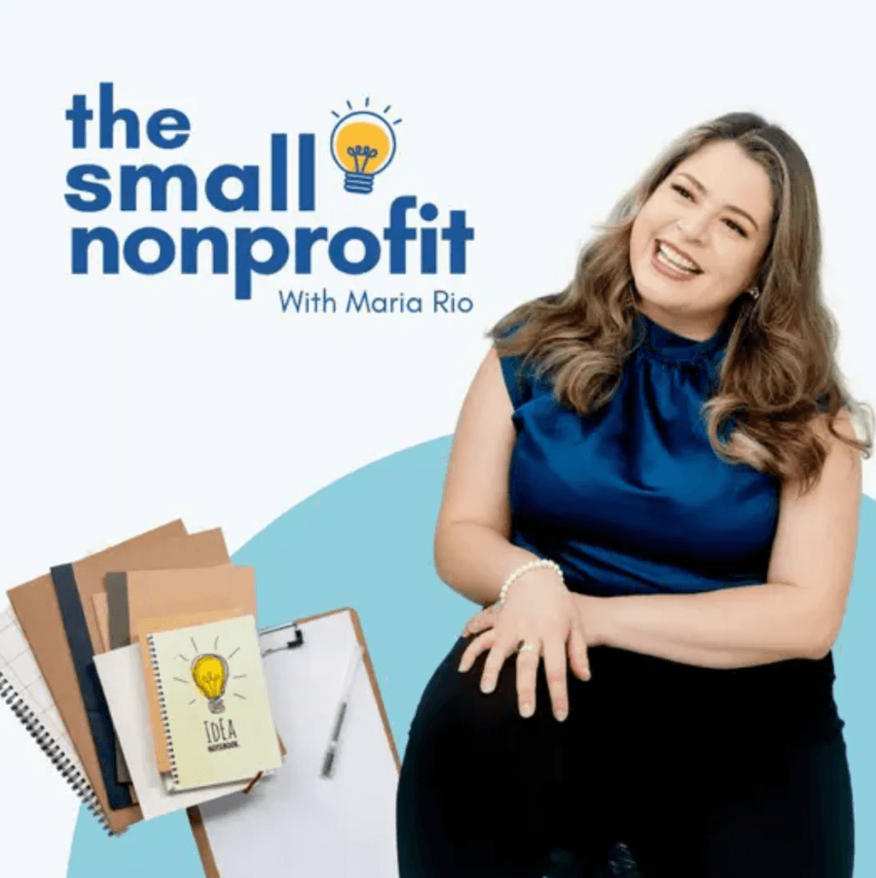 Podcast cover for The Small Nonprofit with Maria Rio. The design features a smiling Maria Rio sitting against a light blue and white background, with stacked notebooks in the corner. The title is in lowercase blue text with a yellow lightbulb icon above the word “nonprofit.”